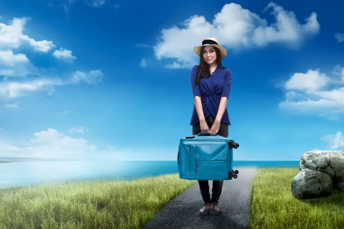 young-asian-traveler-woman-carrying-suitcase